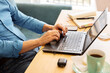 © Ángela Rober/Stocksy - Unrecognizable man works on his laptop from his home office