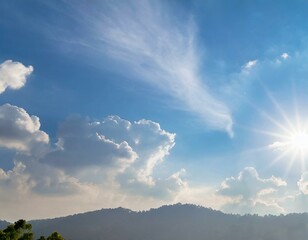 Wall Mural - the sky has the light of the sun, the sky is blue, there are small and large clouds alternating and 