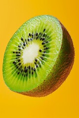 Sticker - A close up of a kiwi fruit with black spots on it. Generative AI.