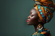 © Eleanor - A side profile of an African woman in vibrant traditional headwrap