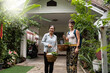 © Alvaro Lavin/Stocksy - Two women after grocery shopping.