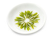 brewed Longjing tea leaves are in a small dish.