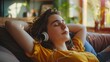 Girl listening to music with headphones and eyes closed