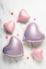 Wall Mural - Heart shaped air balloons on white background. Valentine's day celebration