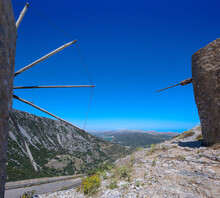Looking Down Into The Far Distance Between The Old Windmills (Lasithi Plateau, Crete, Greece)