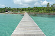 Wooden bridge on sea for entry to the beautiful island.