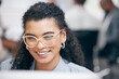 © peopleimages.com - Face, happy and business woman on computer reading email, research or network online in startup office. Closeup, glasses and professional consultant work on project, report or planning on internet