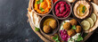 A rustic round wooden platter overflowing with an assortment of organic finger foods, wide shot captured from a top-down perspective