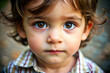 Close-up of a Child's Face: Innocent and curious expression of a child, evoking emotions of purity and wonder.
