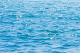 Fototapeta Tulipany - Blue sea water background texture