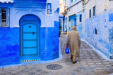 Fototapeta Na sufit - Chefchaouen, Morocco. The old walled city, or medina with its traditional houses painted in blue and white.