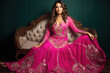 © Neha - young indian woman wearing traditional pink maxi gown