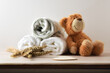 Child's bedding on wooden table with teddy isolated background
