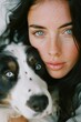 Woman With Freckled Hair and Blue Eyes Hugging Dog