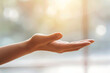 hand offering support and personal assistance, with the background blurred to symbolize focus and clarity in times of need, evoking a sense of reliability and trustworthiness.