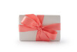 White present box with pink ribbon isolated on white