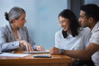 © peopleimages.com - Advisor, paperwork and married or talking in office, meeting and life insurance broker for future investment. Consultant, client and signing for safety or security, people and assurance or contract