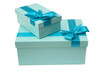 Blue gift boxes with a bow on a white background