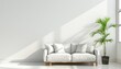 Stylish and inviting modern living room adorned with sofa and plant against pristine white wall
