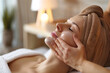 Closeup of relaxing beautiful woman having a massage for herself