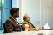 © NVB Stocker - Business meeting - Group of diversity men and women sitting in conference room and smiling at meeting research plan in boardroom. Professional business people brainstorming and teamwork concept.