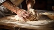 Close-up of a baker's hands scoring dough for artisan breads, showcasing the skill and care in the baking process. 