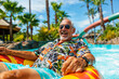 Senior citizen floating on a lazy river ride inner tube at a water park, vacation, tropical, retirement, travel