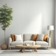 A modern living room featuring a white sofa with orange and white cushions, a wooden coffee table, a floor lamp, and a decorative plant in a corner.