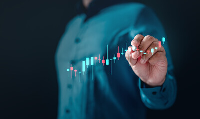 Wall Mural - candlestick, bar, chart, diagram, graph, index, investor, investment, statistic, strategy. A man is drawing a candlestick graph on a screen. The graph is showing a downward trend.