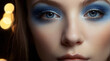 Close up of beautiful woman's blue eyes with blue eyeshadow