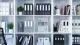 Fototapeta  - Close-up of white office shelves displaying various stationery