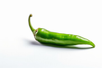 Fresh green chilli on white background