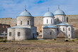 Two ancient temples in the Ivangorod fortress on a sunny March day. Leningrad region, Russia