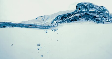 Wall Mural - Many bubbles in water close up, abstract water wave with bubbles in slow motion