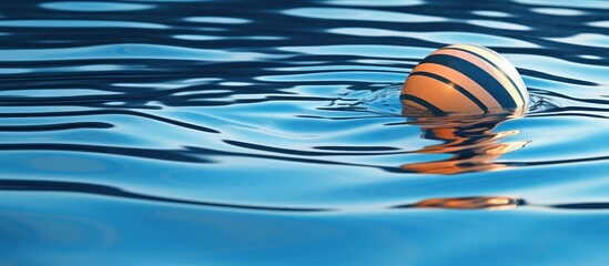 ball floating in a swimming pool.