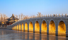 Seventeen-Arch Bridge At Sunset With Golden Color In Winter, Summer Palace, Beijing, China