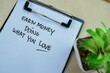 Concept of Earn Money Doing What You Love write on paperwork isolated on wooden background.