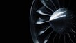 © Artyom - Close-up of jet engine turbine against dark background
