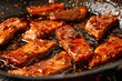 Savory and Sizzling Pork Slices Marinated in Delectable Sauce and Cooked to Perfection in a Pan