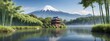 Bamboo, tranquil lake, Mount Fuji backdrop.