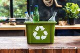 Fototapeta  - Recycling bin with plastic bottles on wooden table. Recycling concept.