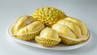 Three durian pieces on plate