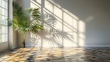 Fototapeta Kwiaty - Interior room with plain wall and shadows of a palm tree by a window. 