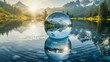 Crystal Ball Reflecting Majestic Mountains in a Serene Lake at Sunrise