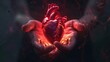 A glowing red heart in the hands of a person