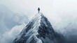 A man stands alone on a snow-capped mountain peak, looking out over a vast landscape.