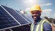© CStock - American engineer or worker smiling at solar panel,Male engineers play a crucial role in the solar energy industry,