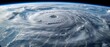 Meteorologists focus on nature's fury as swirling clouds reveal the eye wall in an aerial view of a hurricane from space
