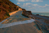 Fototapeta Most - Walking path on the seafront Rhodes island, Rhodes city, Greece