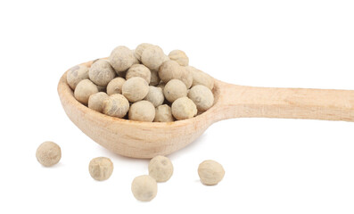 Wall Mural - White pepper peas in the wooden spoon isolated on a white background